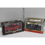 Two boxed die-cast models