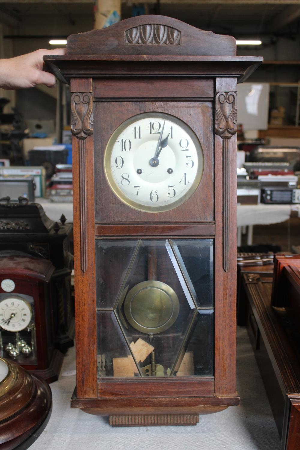 A early 20th century oak cased wall clock a/f postage unavailable