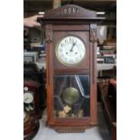 A early 20th century oak cased wall clock a/f postage unavailable
