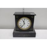 A slate mantle clock converted for battery use postage unavailble