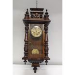 A mahogany cased wall clock a/f postage unavailable