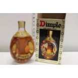 A mid-century 26 2/3 Flo.ozs sealed bottle of Haigh's Dimple Scotch Whiskey in original box
