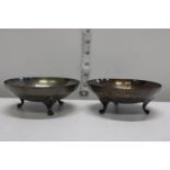 A pair of hallmarked silver footed bowls