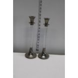 A pair of stylish candlesticks