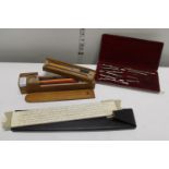 A vintage wooden pencil case & technical drawing instruments