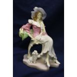 A vintage resin lady figure
