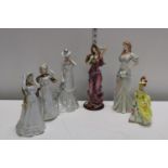 A selection of assorted ceramic ladies
