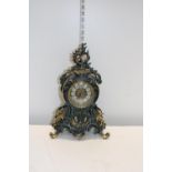 A cast metal vintage mantel clock converted for battery use