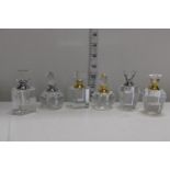 Six glass perfume bottles