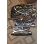 A box of assorted spanners and other tools postage unavailable