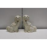 The Staffordshire flat back spaniel figures