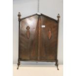 An Arts & Crafts style copper fire screen 'no postage available'