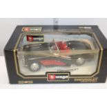 A large boxed Burago die-cast model