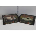 Two boxed Burago die-cast models