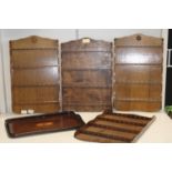 Four wooden spoon display racks and a serving tray