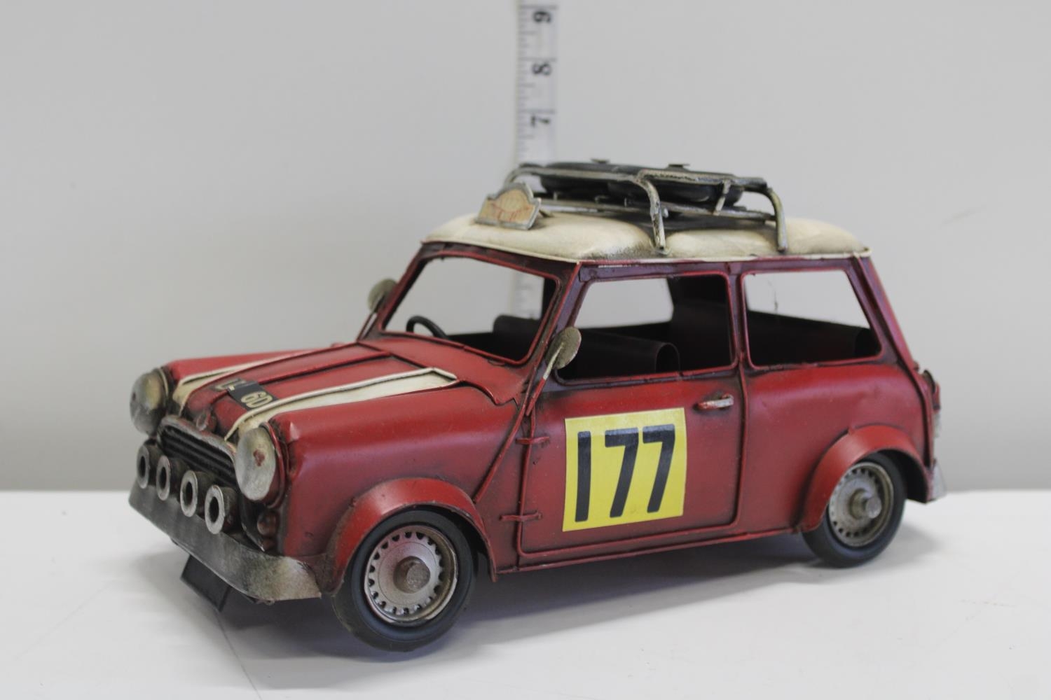 A tin plate model of a Mini 30cm long