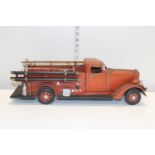 A tin plate model of a fire engine 54cm long