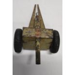 A vintage Nulli Secundus tin plate toy cannon