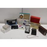 A selection of vintage transistor radios including Roberts