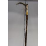 A vintage horn handled walking stick. Postage unavailable