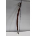 A vintage Indian sword in scabbard 'no postage available'