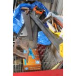 A selection of vintage hand saws and other tools 'no postage available'