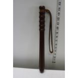 A vintage wooden truncheon