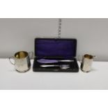 Two pieces of silver plated ware and a boxed cake slice set