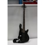 A boxwood bass guitar. Postage unavailable