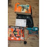 Three Black and Decker electric tools