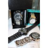 Four assorted men's watches