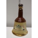 A sealed bottle of Bell's Whiskey in a Wade decanter (75 CL)