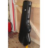 A hard plastic guitar case. Collection only