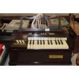 A vintage Rosedale electric chord organ. Postage unavailable