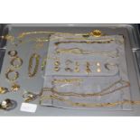A job lot of assorted gold tone costume jewellery