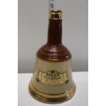 A sealed decanter of Bell's Whiskey 26 2/3 FL Oz