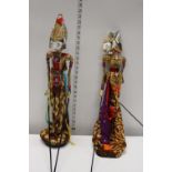 Two large wooden Thai shadow stick puppets