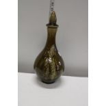 A green glazed Thai themed decanter with stopper