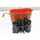 A cased pair of Zenith 10x50 field binoculars