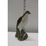 A sealed Beneagles Scotch Whiskey decanter by Beswick (Slight chip to the beak)