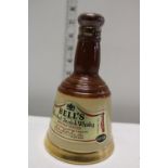 A sealed Bell's whiskey decanter by Wade (18.75 CL)