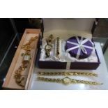 A selection of Ladies gold tone watches and bracelets
