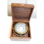 A boxed brass gimbal compass