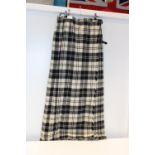 A long tartan skirt