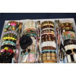 A tray of costume bangles