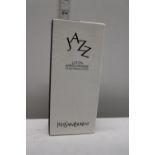 A boxed Yves Saint Laurent after shave lotion