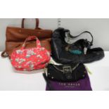 A selection of assorted handbags