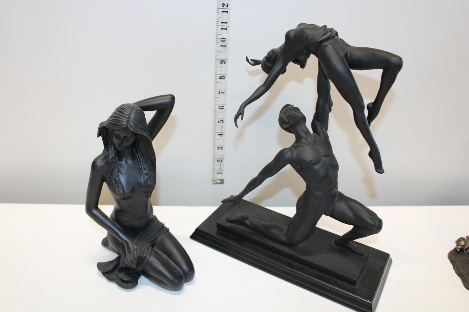 Two collectible figurines