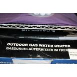 A outdoor gas water heater. Postage unavailable