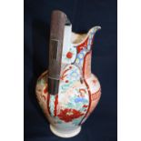 A Chinese jug (damaged), with wooden handle inserted from "The old Bridge of Ayr" 1252 ? with silver